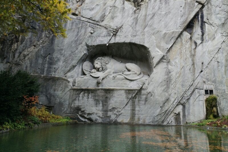 13. In which city would you find the Lion Monument?