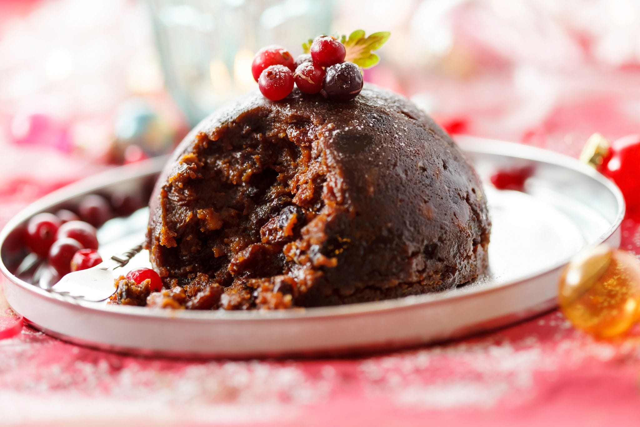 12. What is traditionally hidden inside a Christmas pudding?